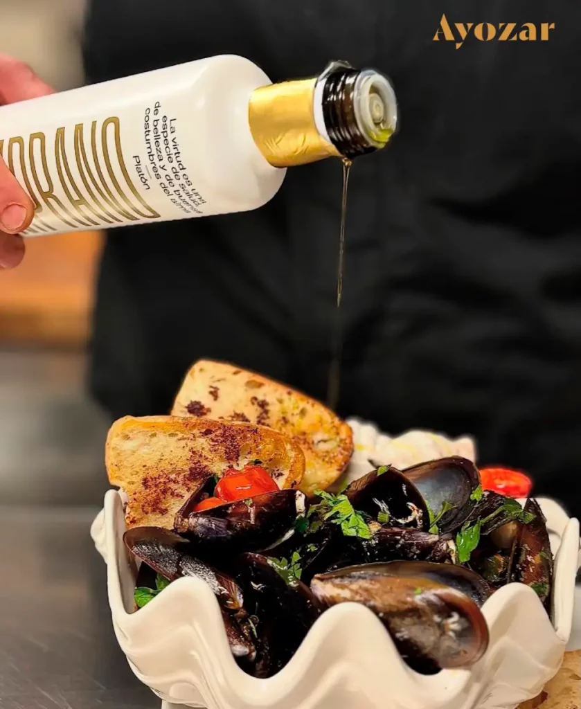 chef cooking with olive oil